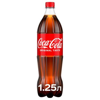 Напиток газированный Coca-Cola 1,25л - купить, цены на КОСМОС - фото 1
