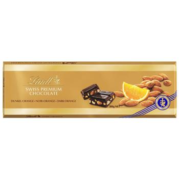 Шоколад черный Lindt Голд с апельсином и кусочками миндаля 300г - купить, цены на КОСМОС - фото 1