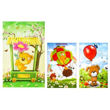 Пакет подарунковий 23х34х10см в асортименті - купити, ціни на КОСМОС - фото 1