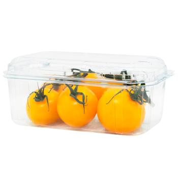 Помидор желтый на ветке