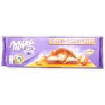 Шоколад молочный Milka с целыми лесными орехами и карамелью 300г