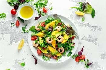 Light salad with tiger shrimps and avocados