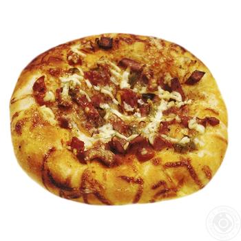 Pizza-snack with sausage